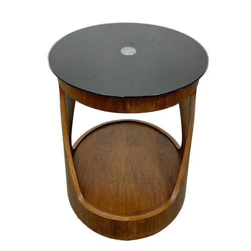 1067 - A mid century teak and glass top end table. 66x49x51cm