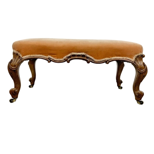 1074 - A large Victorian country house stool in walnut and on Cabriole legs, 90cm x 63cm