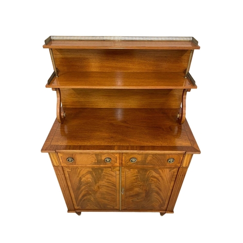 1077 - A Regency style Step Back inlaid mahogany chiffonier with brass gallery. 85.5 x 44 x 133cm.  Key in ... 