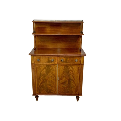 1077 - A Regency style Step Back inlaid mahogany chiffonier with brass gallery. 85.5 x 44 x 133cm.  Key in ... 