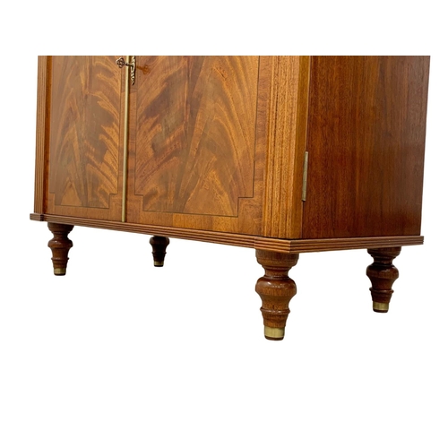 1077 - A Regency style Step Back inlaid mahogany chiffonier with brass gallery. 85.5 x 44 x 133cm.  Key in ... 