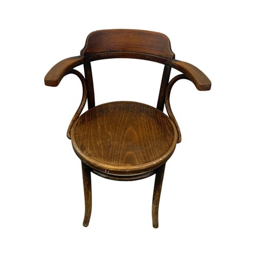 1004 - An early 20th century Bentwood armchair. 66 x 50 x 81cm