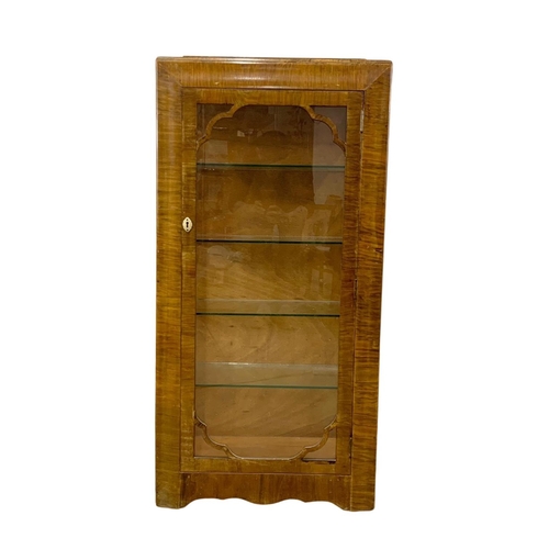 1006 - An Art Deco walnut china cabinet with 4 glass shelves. 1930-1950. 61 x 26.5 x 123cm.