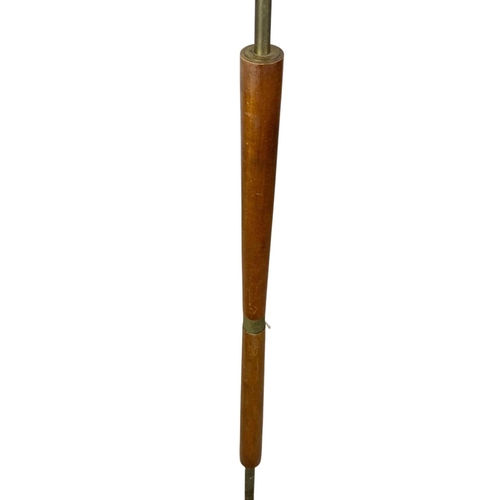 1007 - A teak and brass Mid Century standard lamp. 141cm.