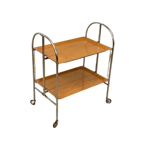 1018 - A Bremshey & Co folding serving trolley. 65.5 x 41 x 79cm