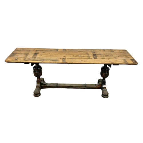 1020 - A large refractory style table. 221 x 64 x 77cm.