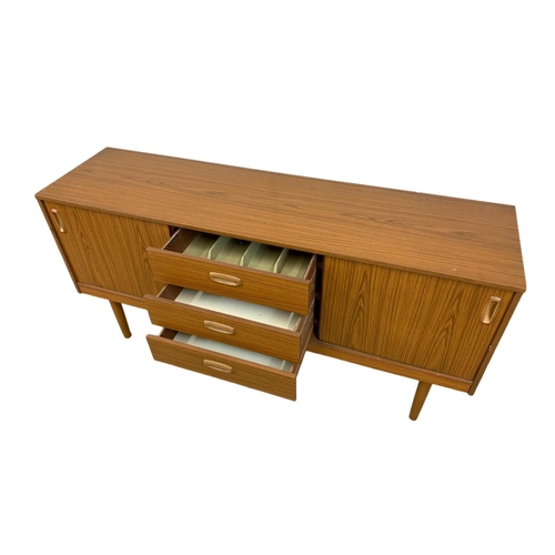 1021 - A Mid Century sideboard by Schreiber. 152 x 41 x 73cm.