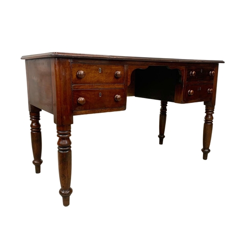 1028 - A Victorian mahogany leather top writing desk with 4 drawers. Circa 1860-1870. 126 x 56.5 x 76cm.