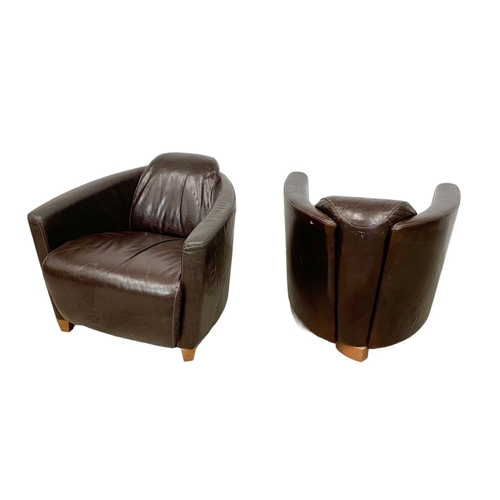 1037 - A pair of modern Art Deco style leather armchairs. 75 x 87 x 71cm.