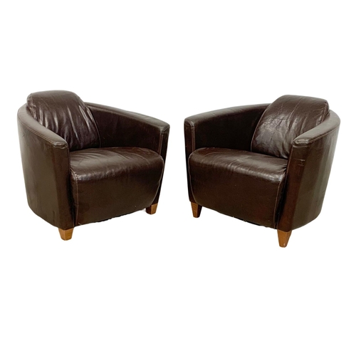 1037 - A pair of modern Art Deco style leather armchairs. 75 x 87 x 71cm.