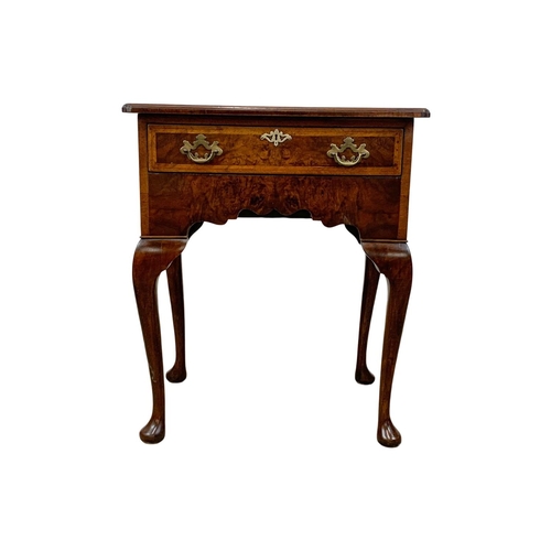 1040 - A Georgian style inlaid walnut lowboy with drawer on cabriole legs. 62 x 45 x 73.5cm