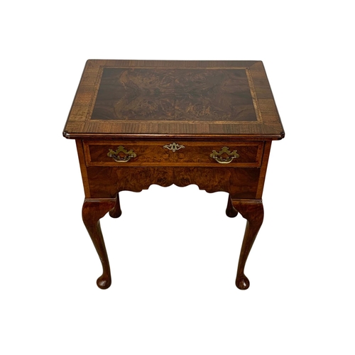 1040 - A Georgian style inlaid walnut lowboy with drawer on cabriole legs. 62 x 45 x 73.5cm