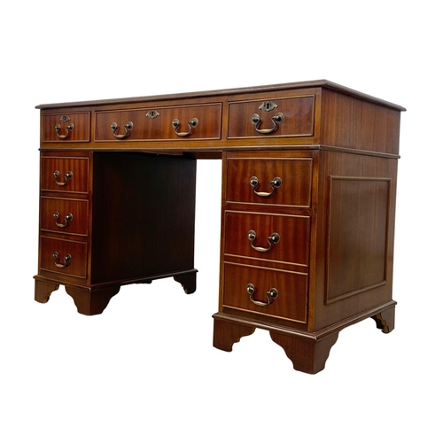 1045 - A Georgian style mahogany leather top pedestal desk. 122 x 60.5 x 77cm