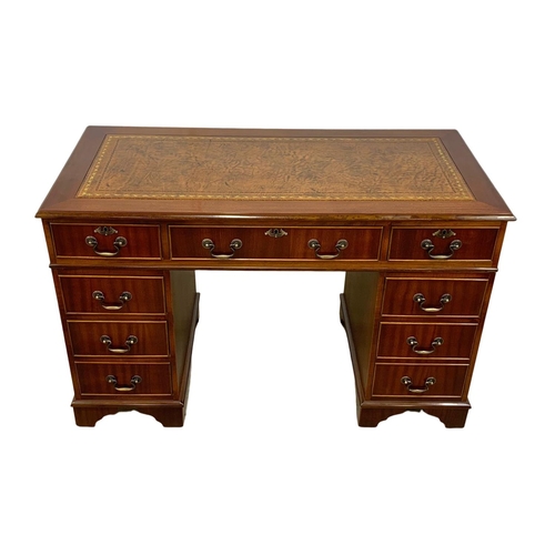 1045 - A Georgian style mahogany leather top pedestal desk. 122 x 60.5 x 77cm