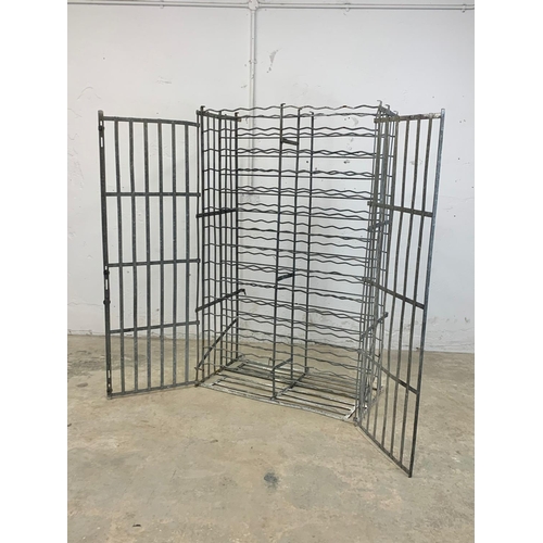 1048 - A large vintage industrial metal double door wine rack. 102 x 55.5 x 162cm.