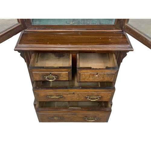 1050 - A late Victorian burr walnut Apprentice bookcase. Circa 1890. 58 x 31 x 128cm