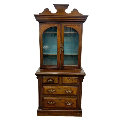 1050 - A late Victorian burr walnut Apprentice bookcase. Circa 1890. 58 x 31 x 128cm