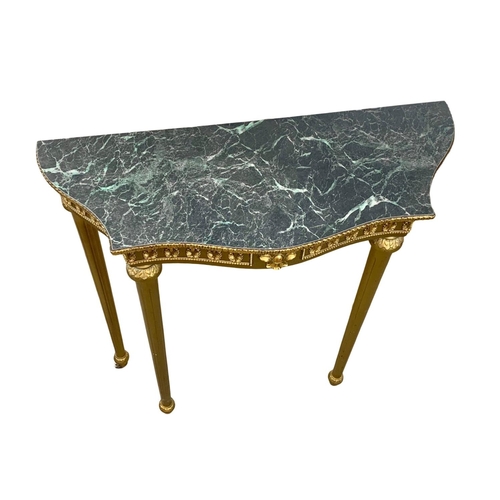 1054 - An ornate hall table with faux marble top. Plastic. 82 x 32.5 x 80.5cm