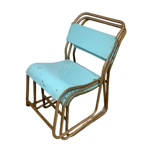 1080 - A set of 8 vintage Cox stacking chairs.