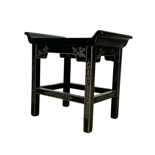 1085 - A Chinese lacquered stool. 46 x 29.5 x 43cm.