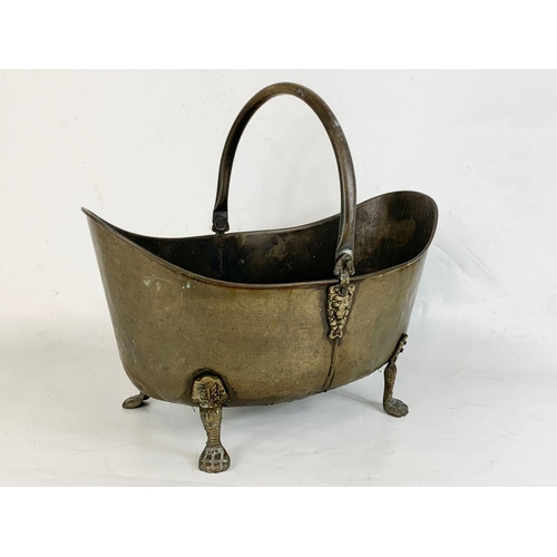 109 - A vintage Georgian style brass coal scuttle. 47 x 29 x 27cm.