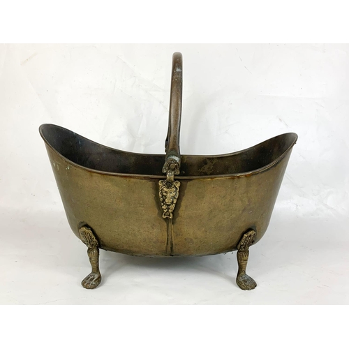 109 - A vintage Georgian style brass coal scuttle. 47 x 29 x 27cm.