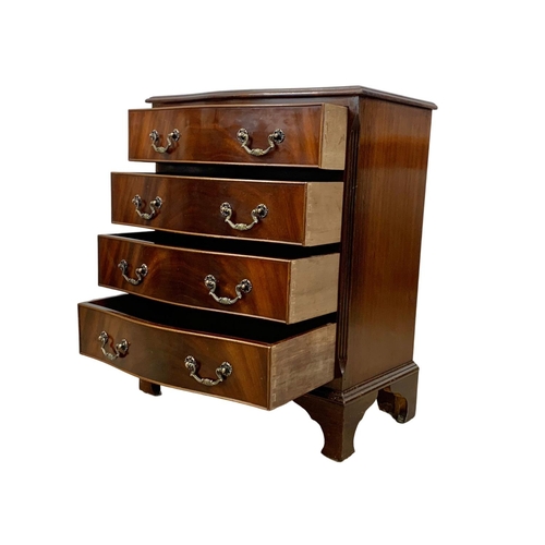 1094 - A Georgian style mahogany serpentine chest of drawers. 63 x 48.5 x 77.5cm