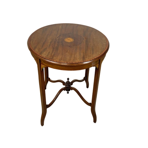 1111 - An Edwardian inlaid mahogany window table. 60 x 71.5cm