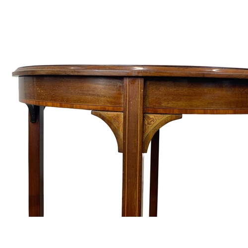 1111 - An Edwardian inlaid mahogany window table. 60 x 71.5cm