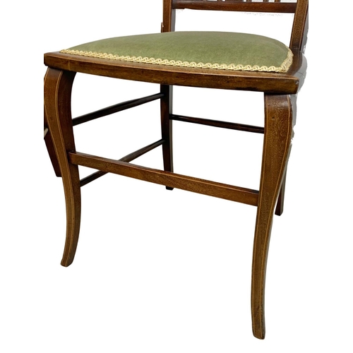 1116 - A pair of Edwardian inlaid mahogany side chairs.