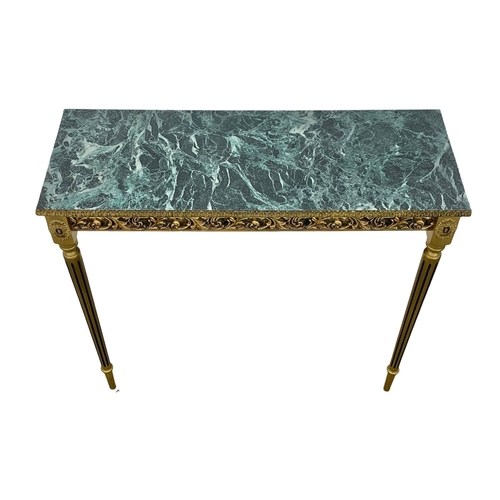 1117 - An ornate hall table with faux marble top. Plastic. 82 x 30.5 x 74cm