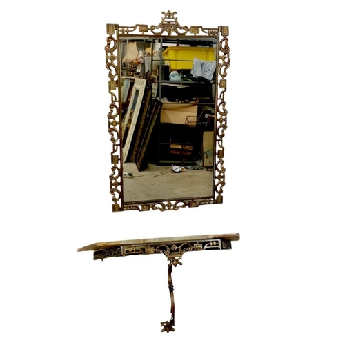 1119 - An ornate brass and onyx hall table and matching mirror. Mirror measures 51.5 x 82.5cm