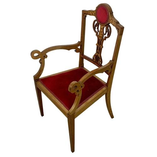 1124 - An Edwardian inlaid mahogany armchair.