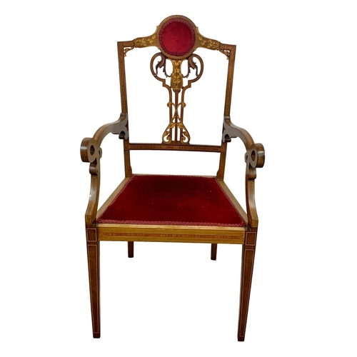 1124 - An Edwardian inlaid mahogany armchair.