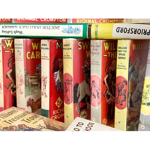 114 - A collection of vintage books. Including 17 William books by Richmal Crompton, 5 “Famous Five” books... 