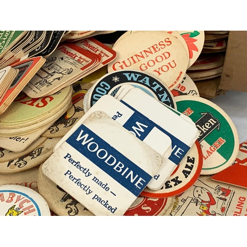 120 - A large quantity of vintage beer coasters.