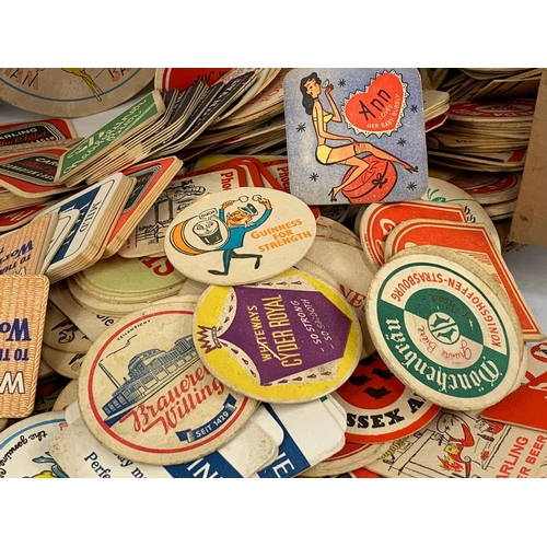 120 - A large quantity of vintage beer coasters.