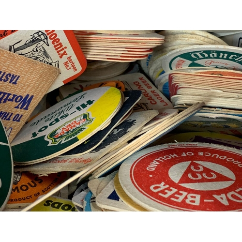 120 - A large quantity of vintage beer coasters.