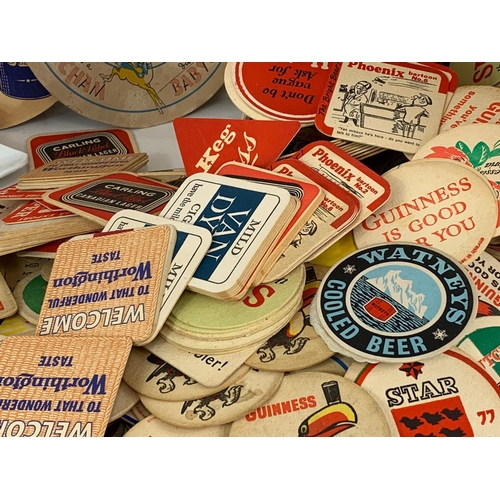 120 - A large quantity of vintage beer coasters.