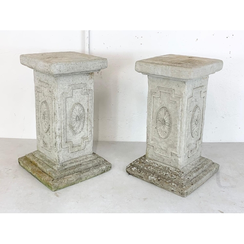 121 - A pair of concrete garden stands. 29.5 x 48cm.