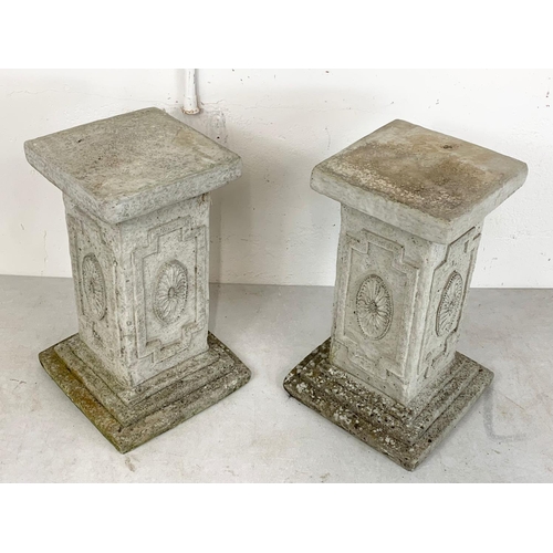 121 - A pair of concrete garden stands. 29.5 x 48cm.