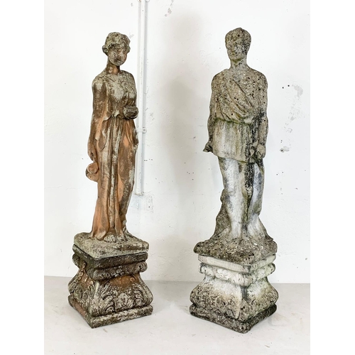 123 - A near pair of large concrete garden figures on plinths. 114cm.