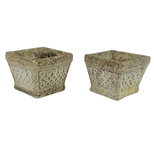 125 - A pair of concrete garden planters. 30 x 30 x 24cm