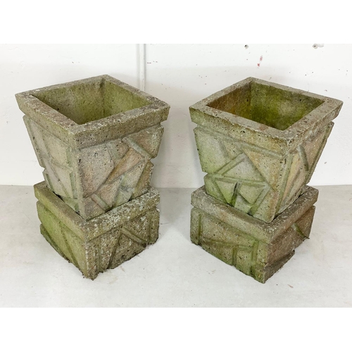 126 - A pair of large concrete garden planters. 33 x 58cm.