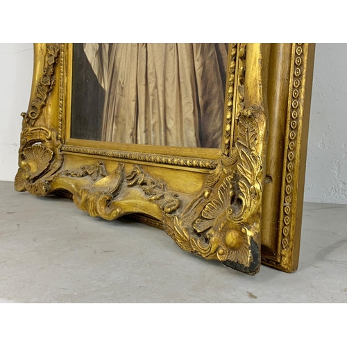 127 - A very large heavy gilt framed print. 91.5 x 123cm.