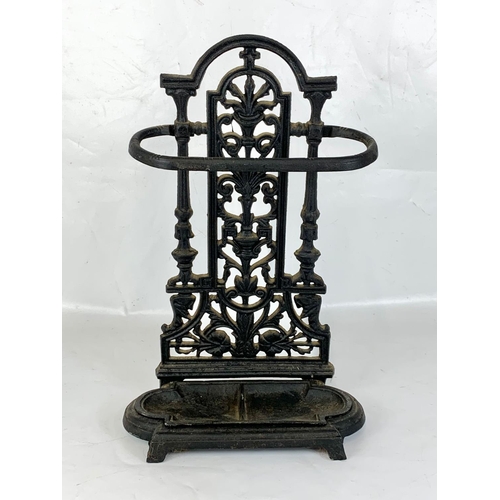 128 - A Victorian style cast iron stick stand. 33 x 52cm.