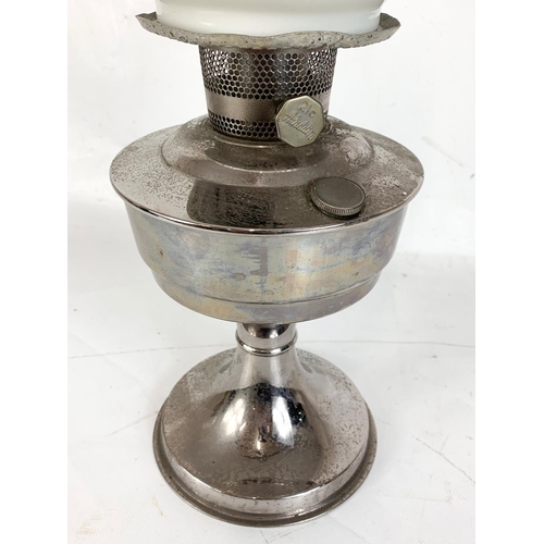 14 - A vintage oil lamp. 60cm