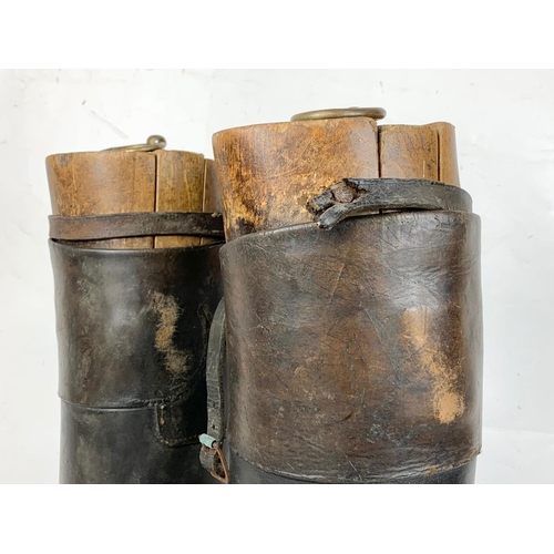 140 - A pair of large late Victorian leather riding boots. 32 x 52cm.