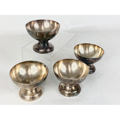 142 - A set of 4 Military dessert bowl. Stamped. 9 x 7cm.