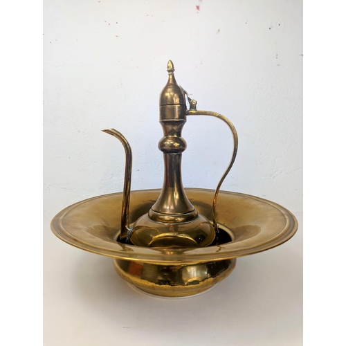 144 - A large vintage brass bowl and a Middle Eastern brass pitcher. Bowl measures 38x11cm